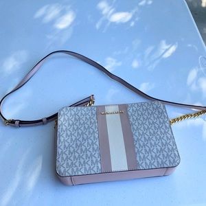 Michael Kors Jet Setter $100